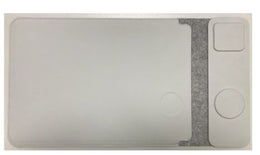 The VELA charging panel laid flat, with the round phone pad and square earbud pad
