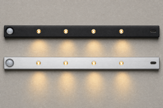 The matte black and brushed silver Ambient Sensor Light side by side